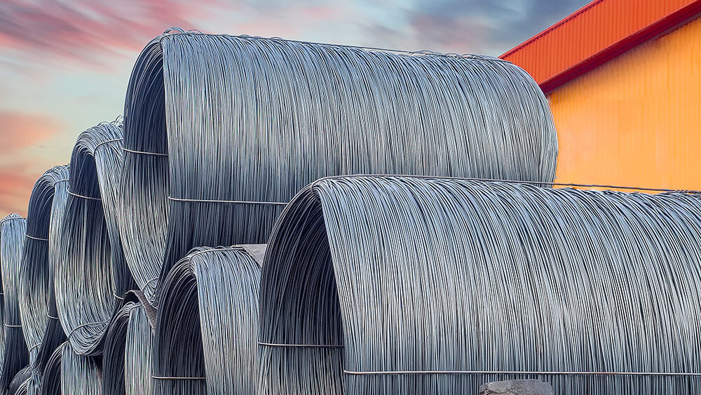 Stacking of wire rod on truck for delivery to customer. Pile of Outside Plant MRO e1734730907826